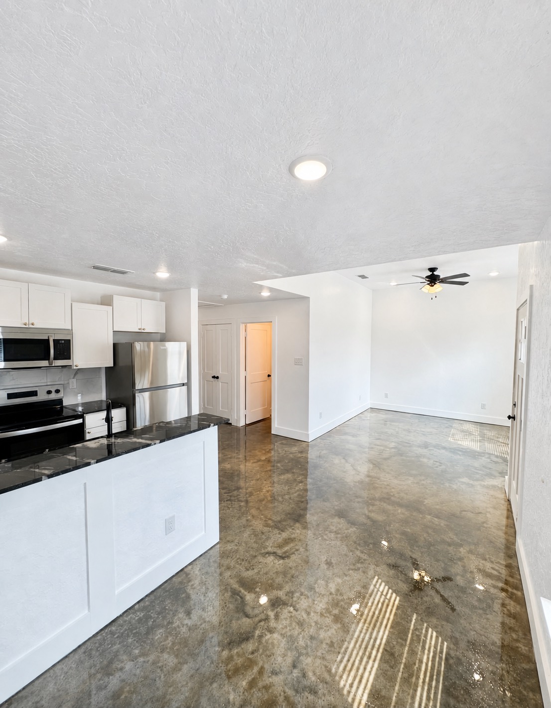 Open kitchen and living area in a Skinner Investment Properties rental home