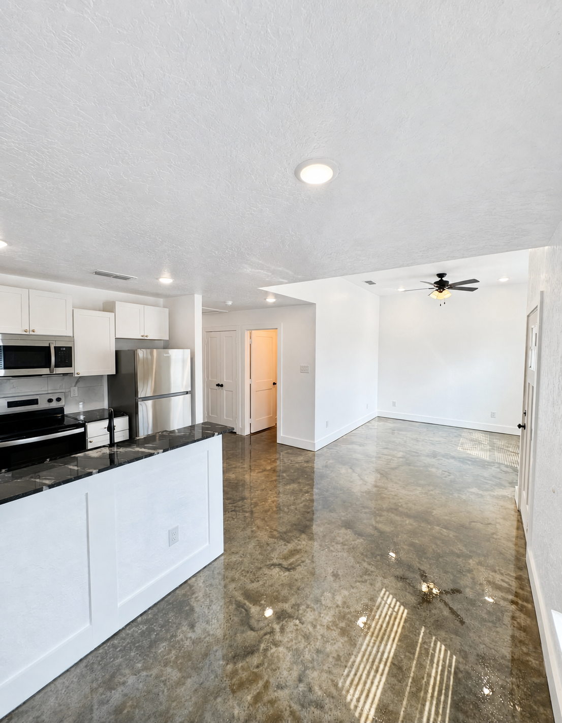 Open kitchen and living area in a Skinner Investment Properties rental home