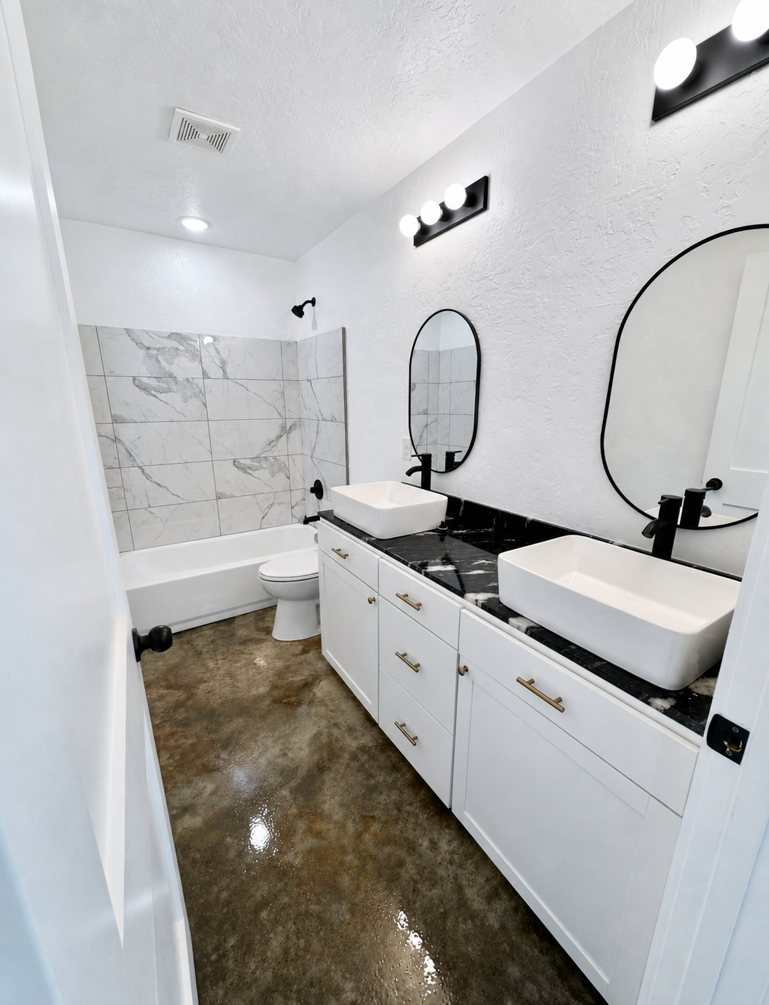 Double-vanity bathroom in a Skinner Investment Properties rental home